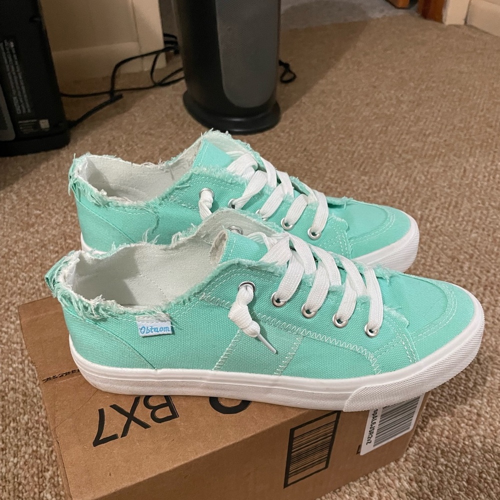 Brand new slip on shoes. Aqua. Worn once. Excellent condition. Size 8